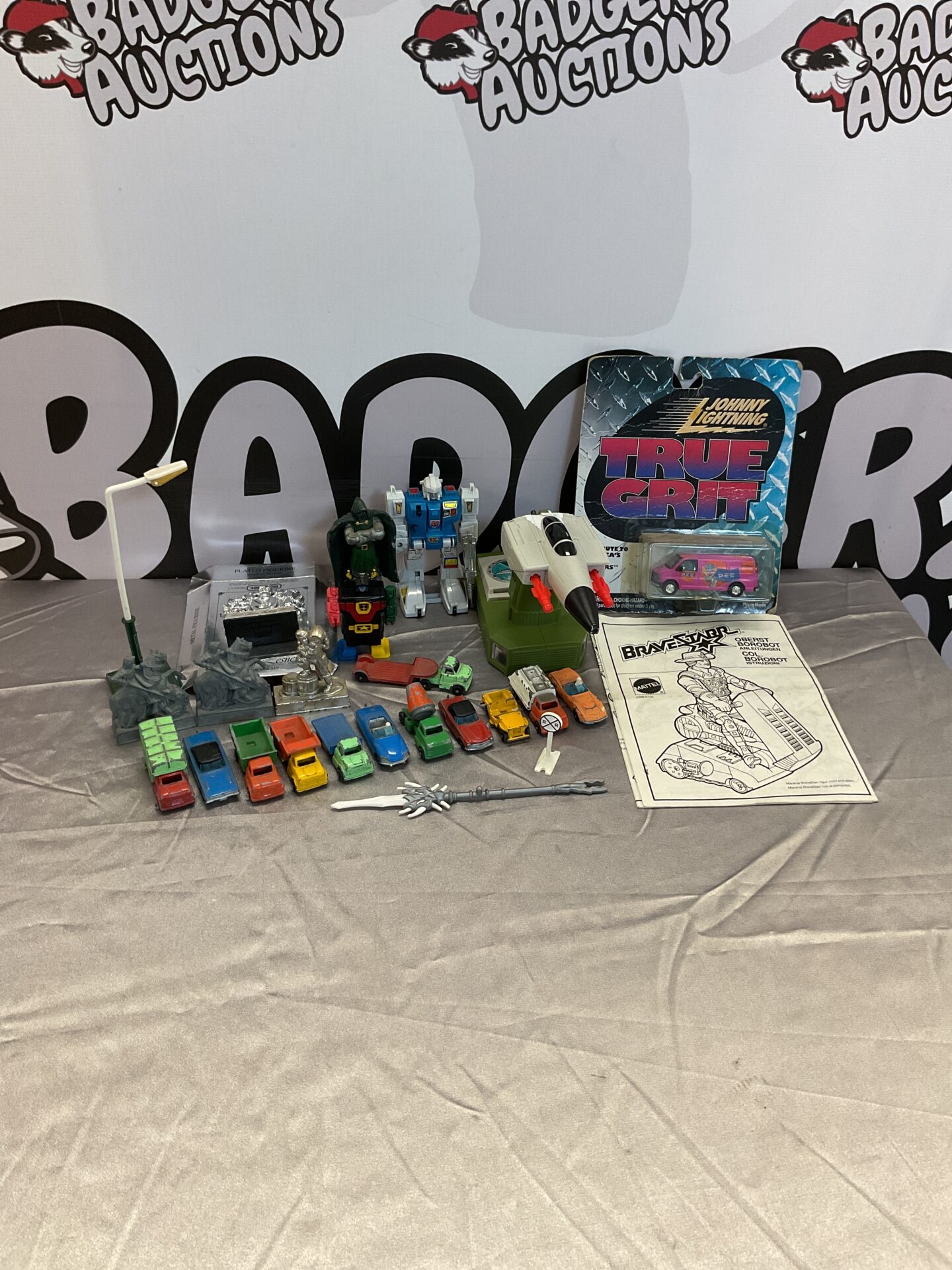 414 Box of mixed retro and vintage toys inc vintage lone star diecasts, retro johnny lightning diecast and 1975 lesney lead figures