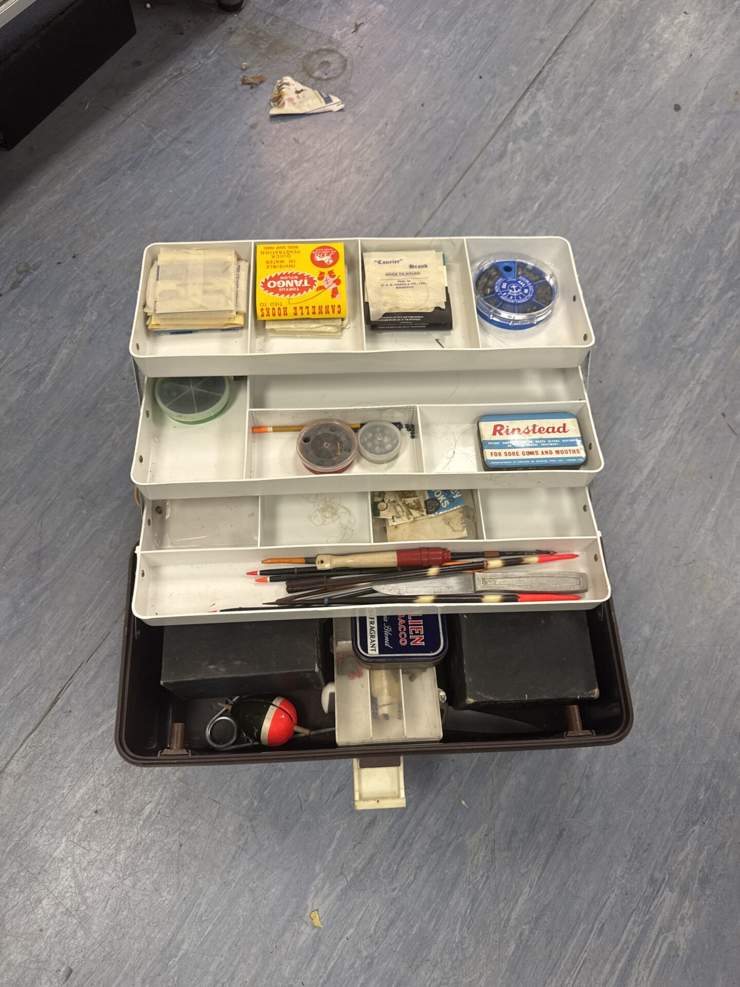 1143 Small fishing tackle box with two boxed mitchell fixed spool reels