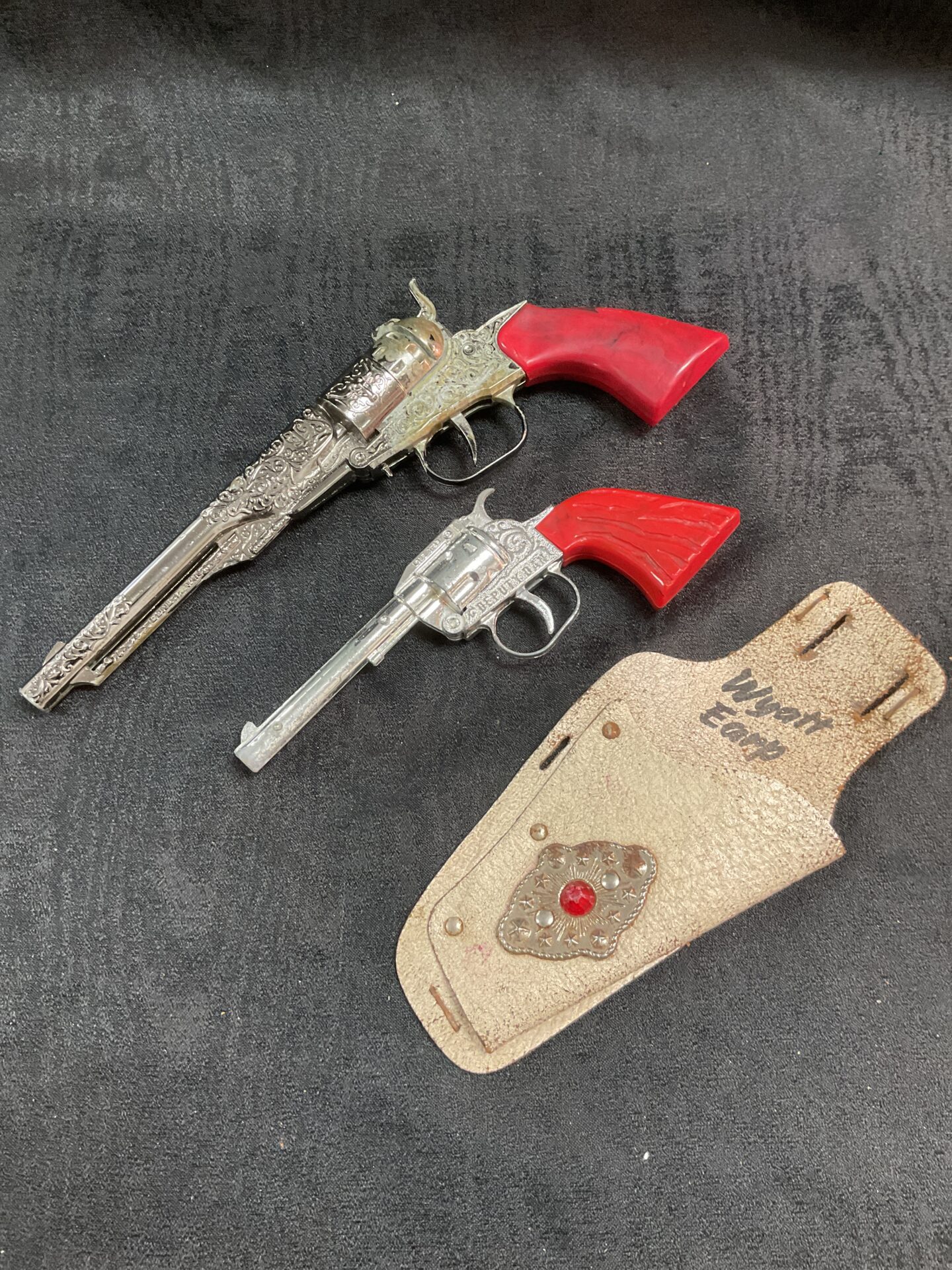 954 Two vintage lone star cap guns and wyatt earp holster