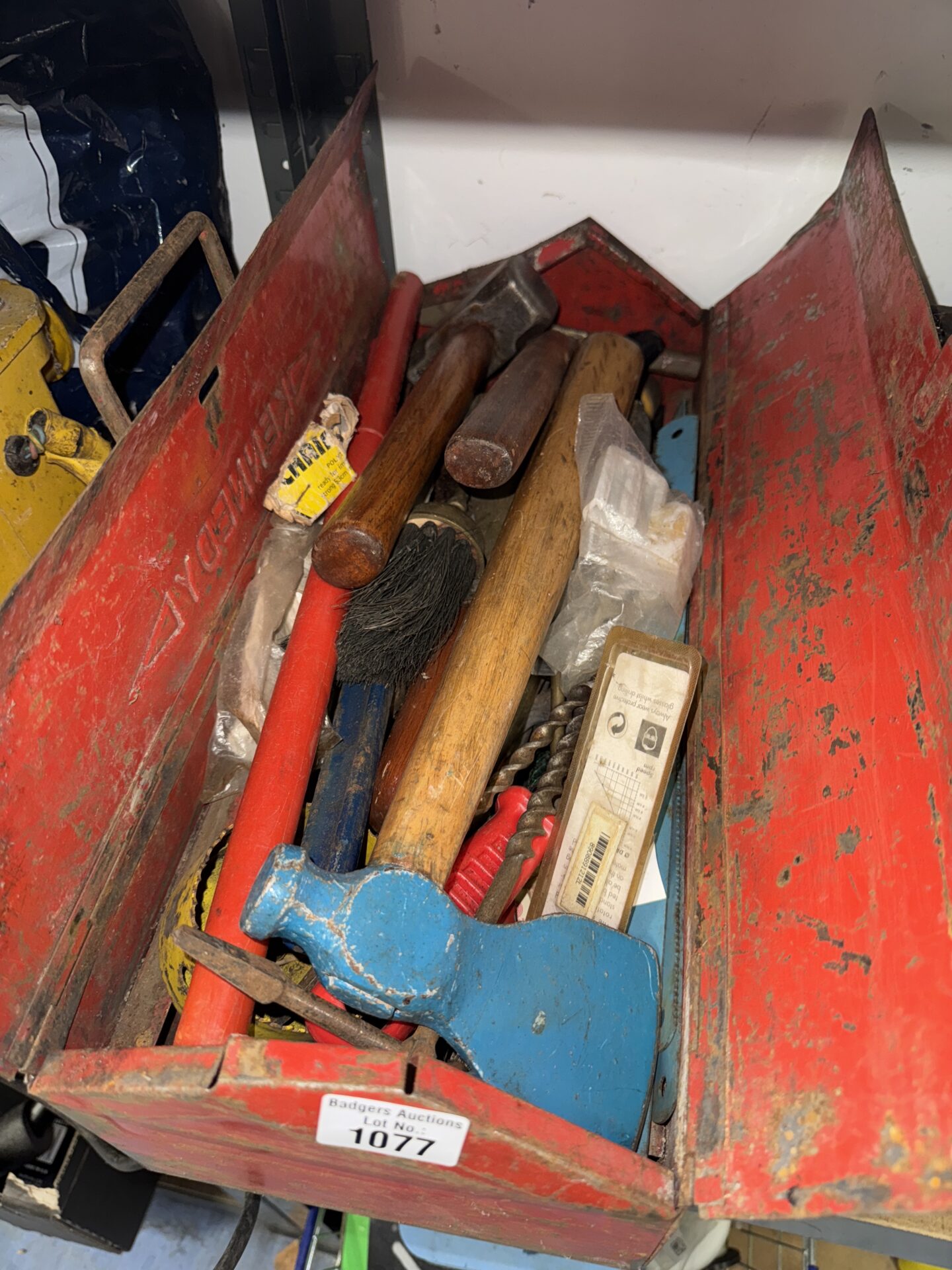 1077 Vintage metal toolbox with contents