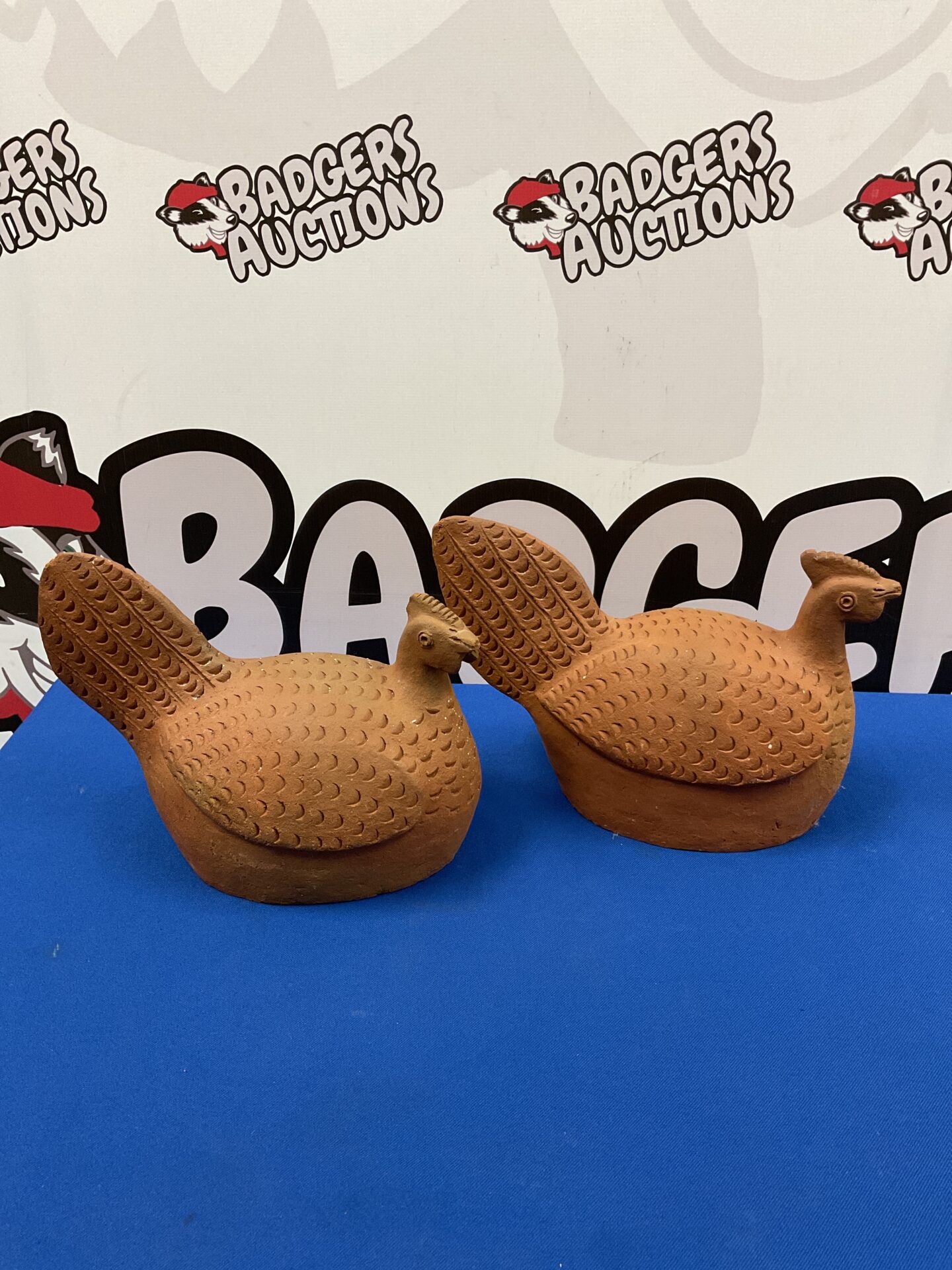 049 Two terracotta chickens
