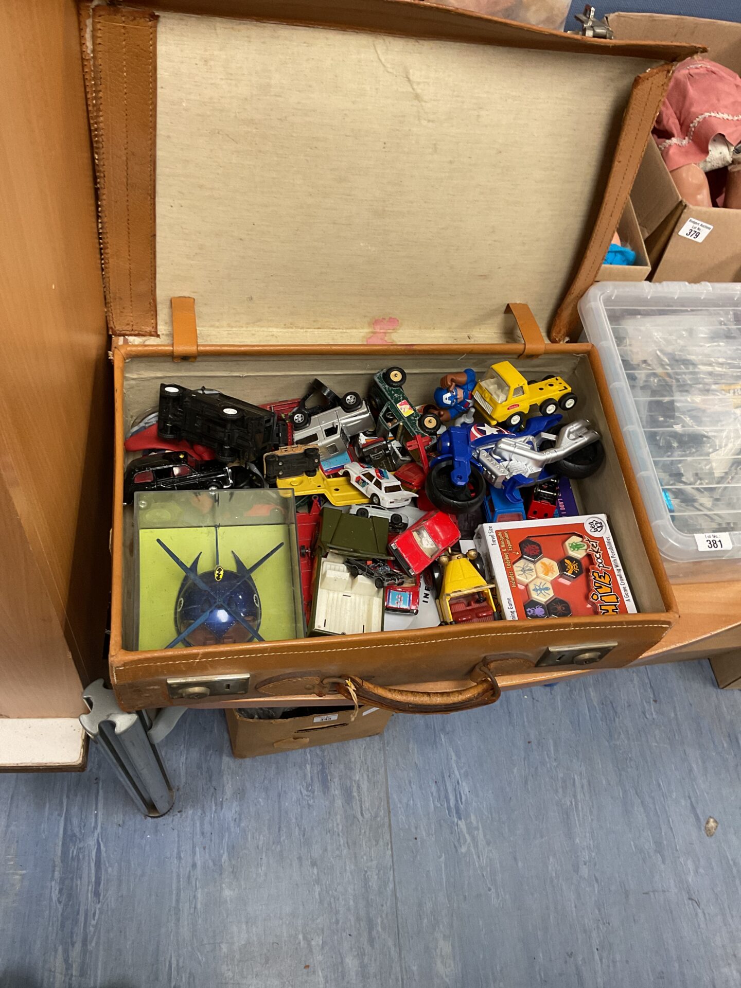378 Vintage suitcase full of mixed toys inc diecasts inc tonka