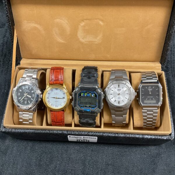 Vintage watch lot featuring a Casio and analogue timepieces.