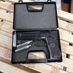 Closed case containing a vintage Walther PPK pistol.