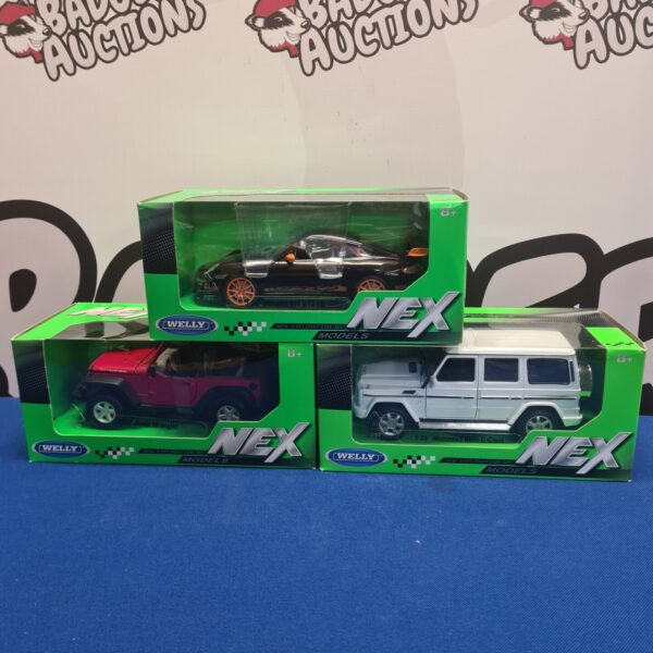 Welly NEX diecast model cars in boxed lot.