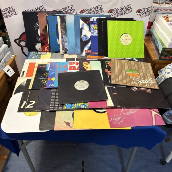 Collection of 50 12 inch dance vinyl records for DJs and collectors.