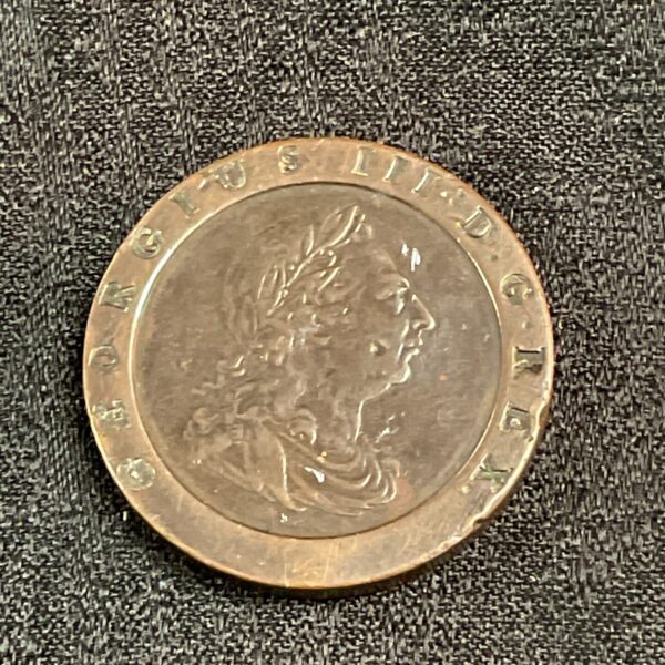 Obverse of a 1797 George III Cartwheel penny, showing the king's bust.