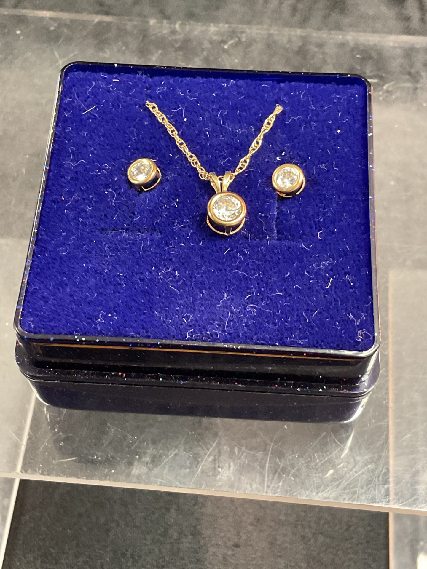 990 9ct gold white stone earrings and matching necklace