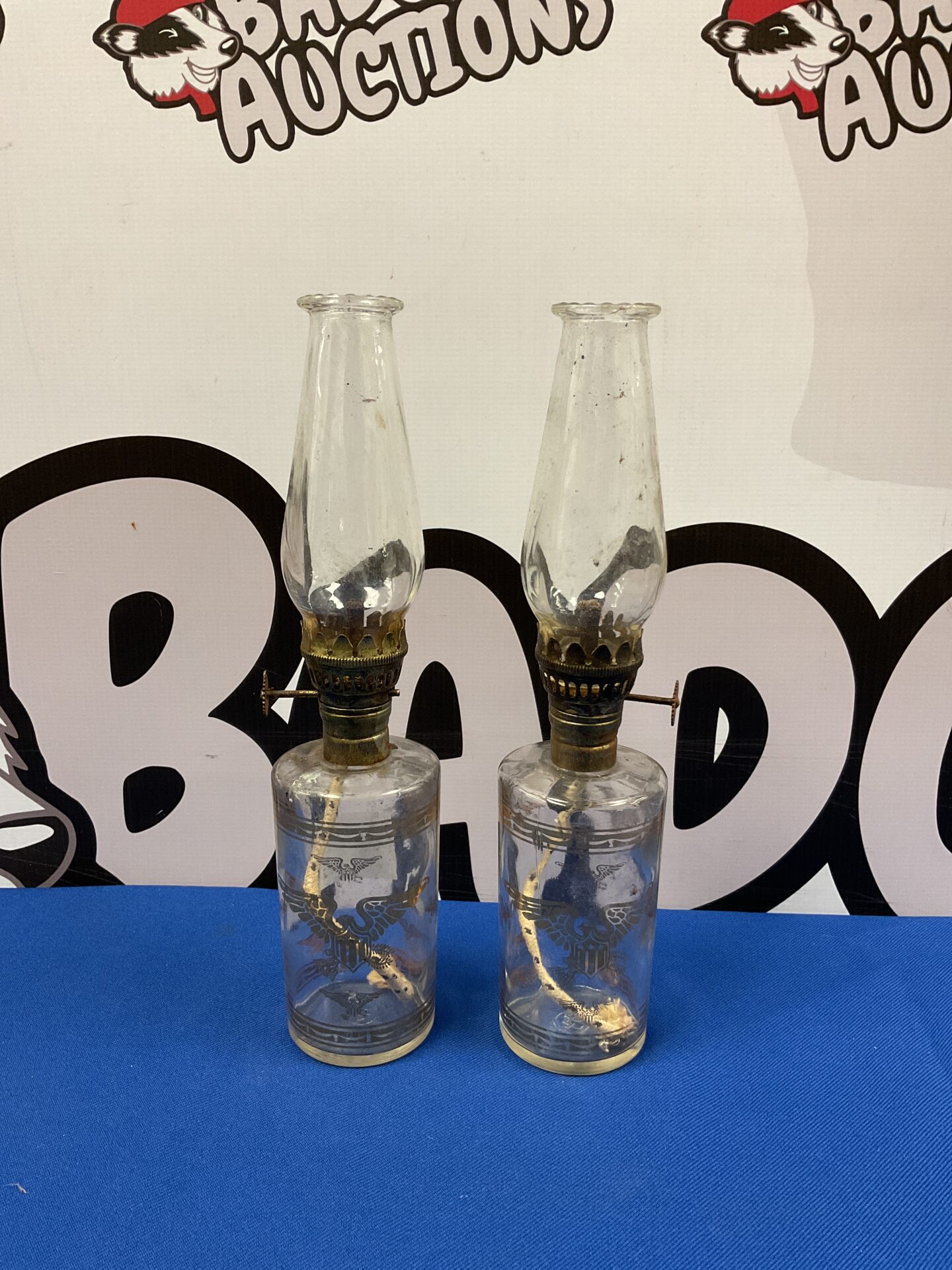 040 Pair of glass American Eagle oil lamps 10” tall