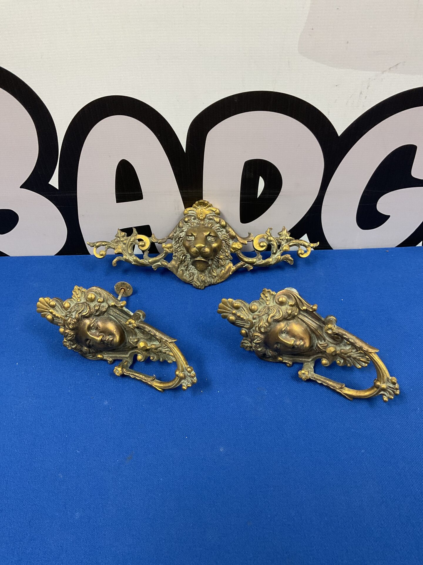 007 Pair of antique brass door pulls & lion head finial