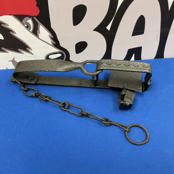 Antique cast iron gin trap for collecting or display.