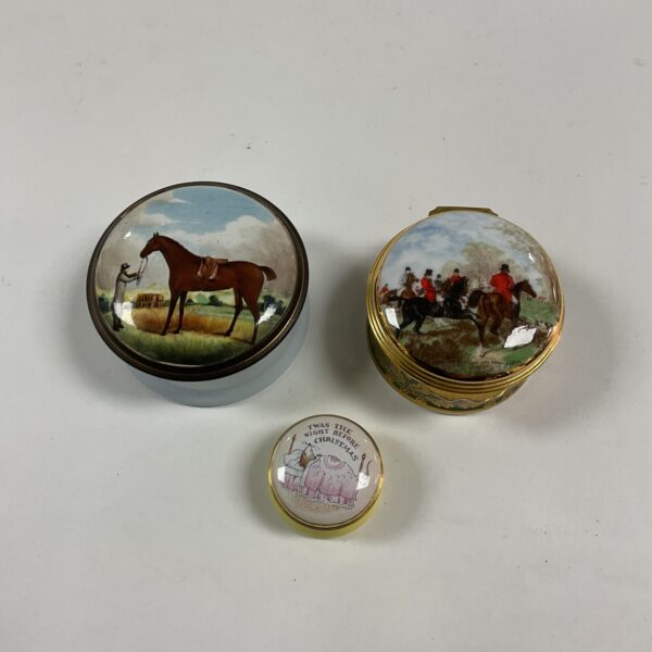 Set of three antique enamel trinket pots with hand-painted scenes.