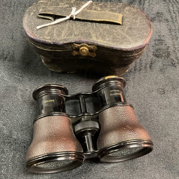 Antique Lemaire Fabe opera glasses with brown leather case.