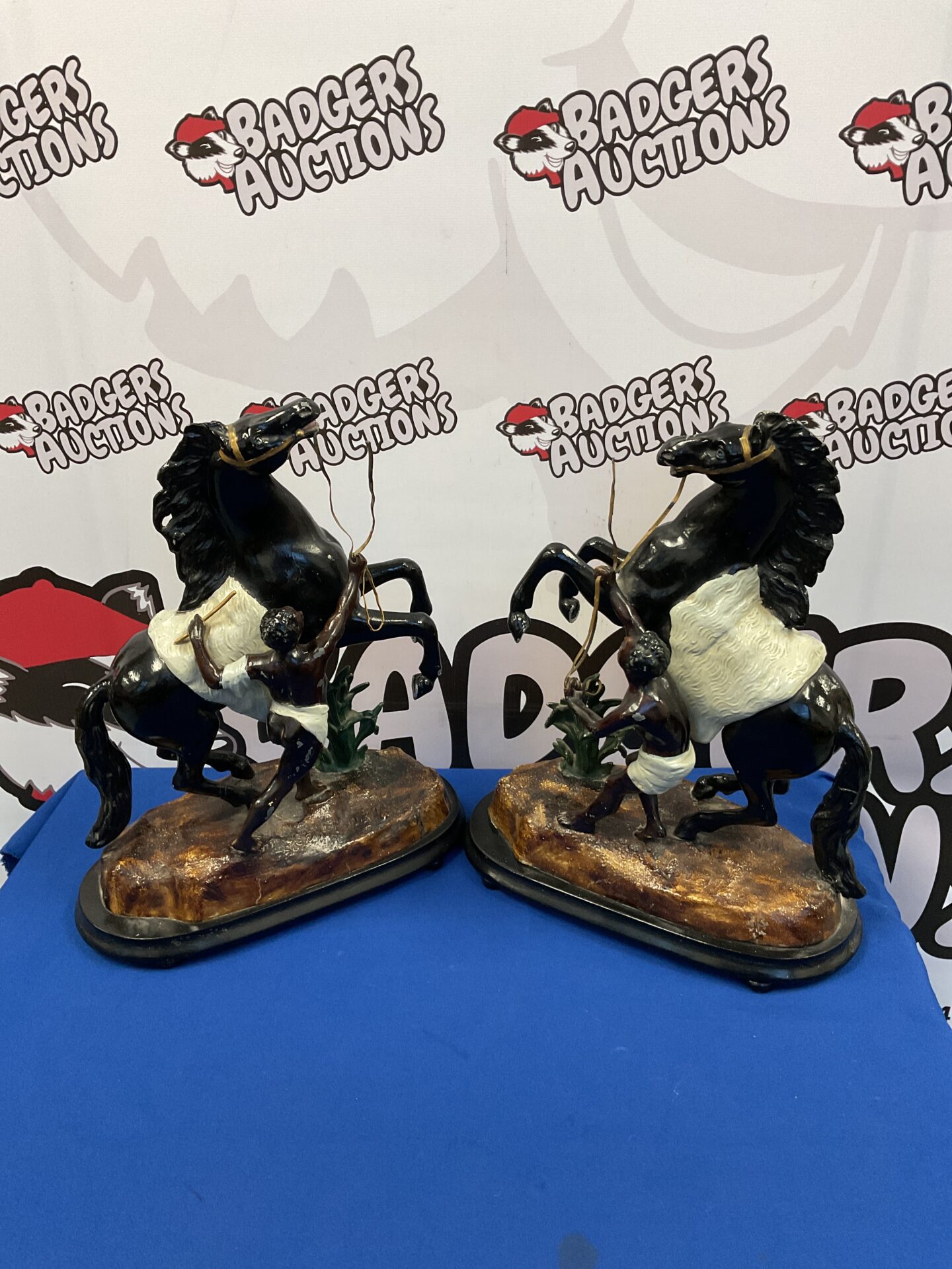 002 Pair of antique spelter rearing horses & farriers signed on base