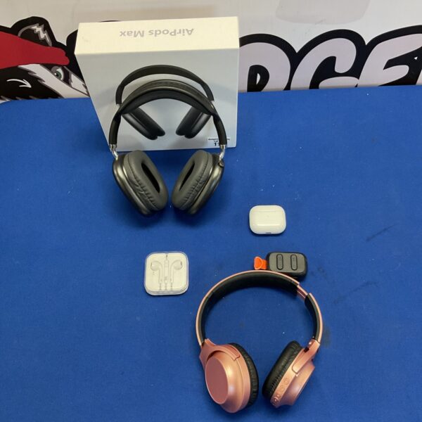 Silver Apple AirPods Max headphones displayed in a studio setting.