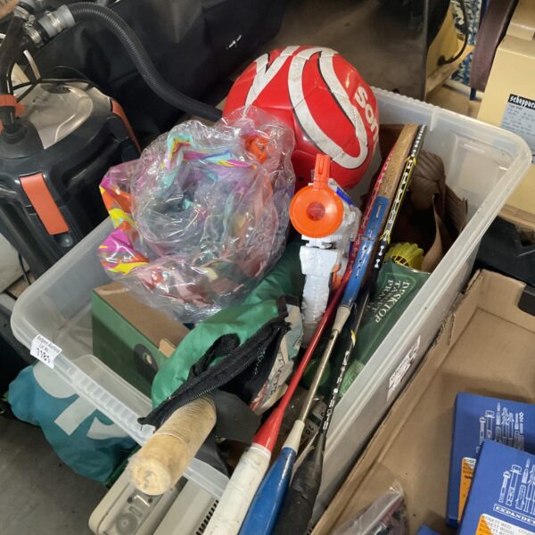Mixed lot of badminton rackets and sports equipment for sale.