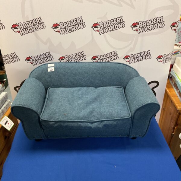 Soft blue pet bed for cats and dogs, comfortable resting space.