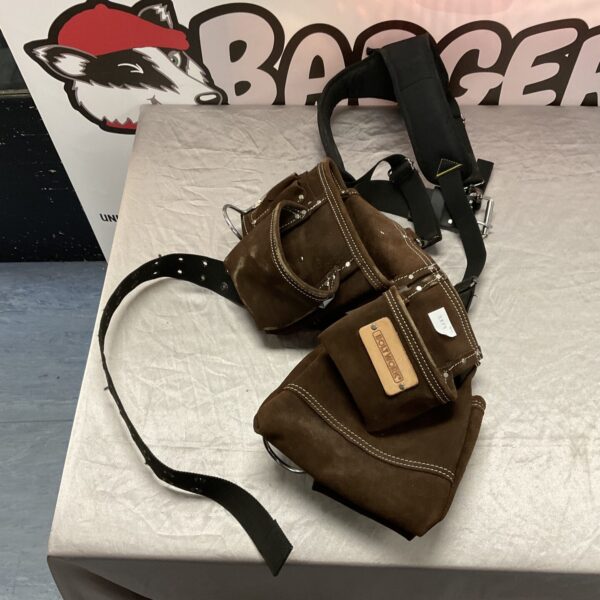 Vintage Boltwork tool harness with leather pockets and adjustable straps.
