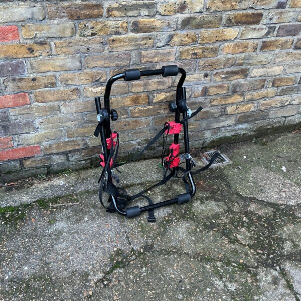 Rear mounted car bike rack for bicycle transport.