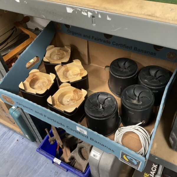 Two sets of wooden chair risers for elevating seating.