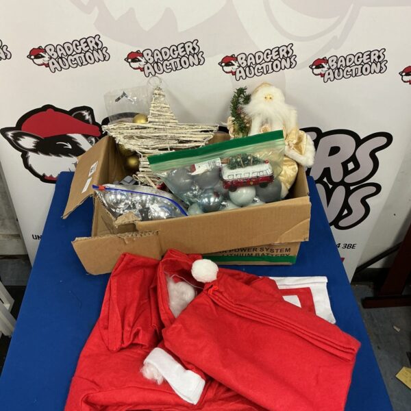 Box of assorted Christmas decorations for festive holiday cheer.