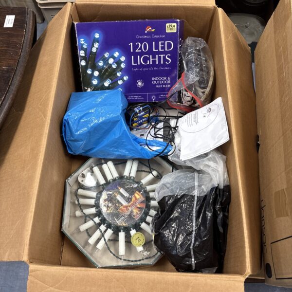 Box of 120 LED Christmas lights for festive decoration.