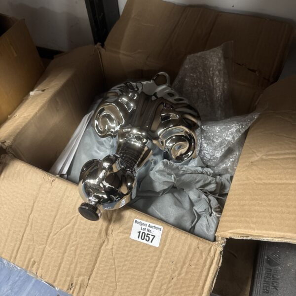 New chrome ornate bath feet for clawfoot tub restoration.