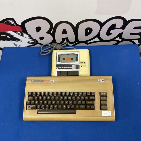 Vintage Commodore 64 computer with Datasette for retro gaming.