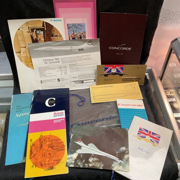 Vintage Concorde ephemera collection including menus and booklets.