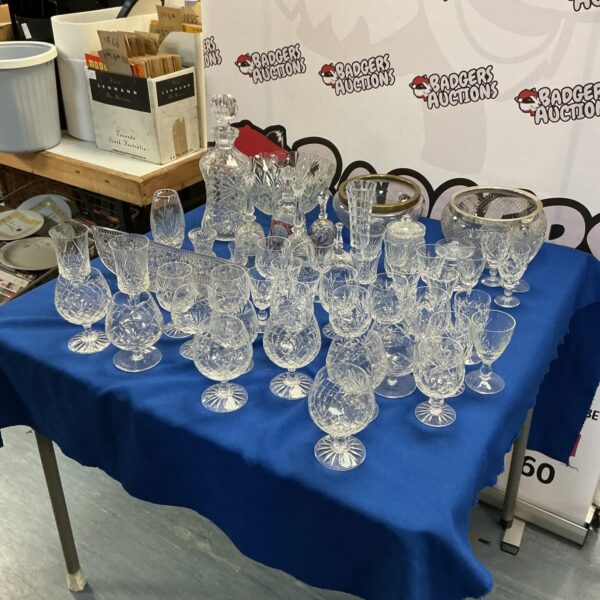 Large lot of vintage crystal glassware including bowls and glasses.