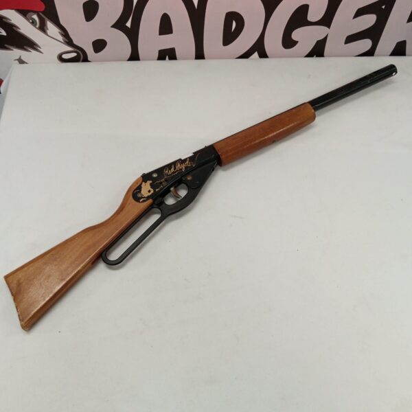 Vintage Daisy Red Ryder rifle, classic BB gun, collectible toy.