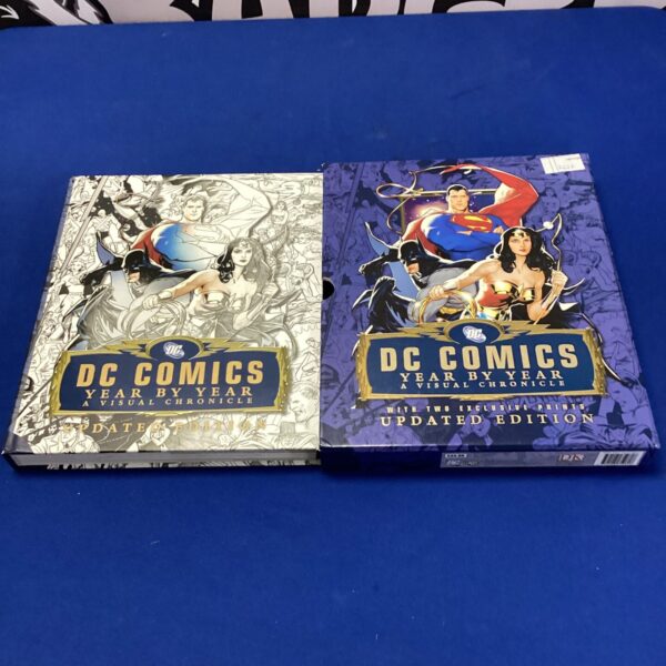 DC Comics Year by Year visual chronicle book with exclusive prints.