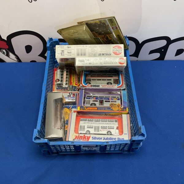 Box of vintage diecast models and model kits, including Airfix, Corgi, and Dinky.