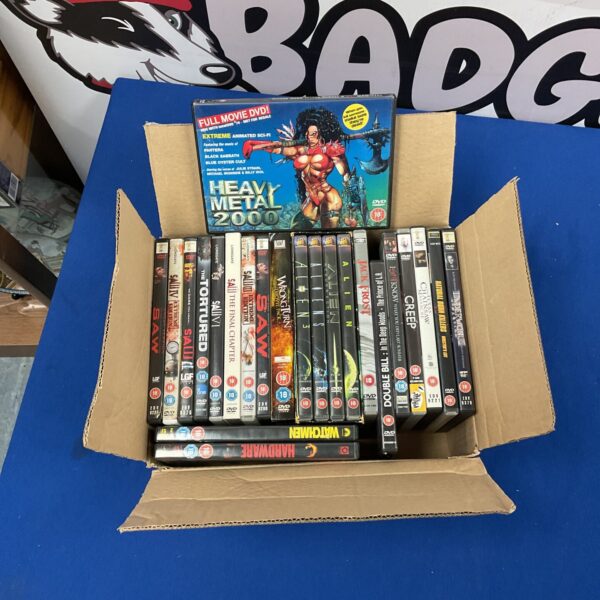 Box of assorted DVD movies including Alien and SAW.
