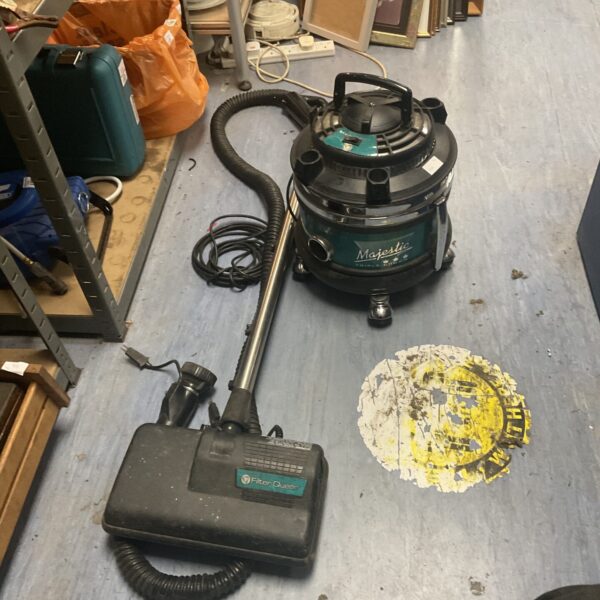 Vintage Filter Queen Majestic Triple Crown hoover in used condition.