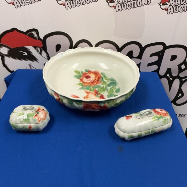 Antique French porcelain wash bowl with floral design.