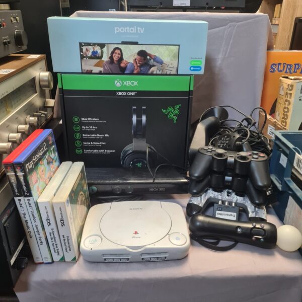 Gaming bundle featuring PS1, Xbox One, and Nintendo DS consoles.