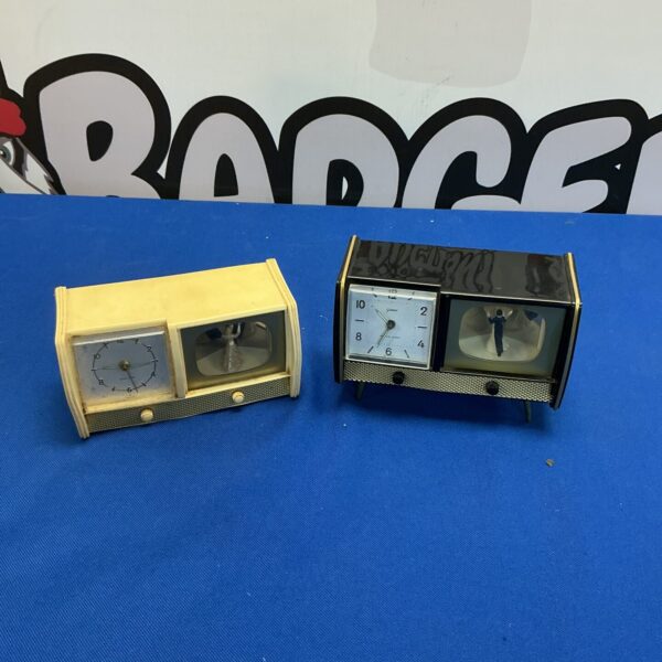 Vintage Goldbahl dancing couple alarm clock, mid century modern design.
