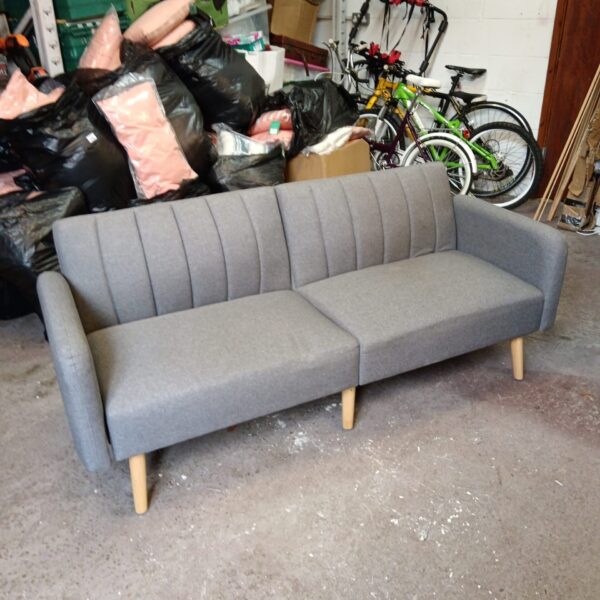 Modern grey Homcom sofa bed in a living room setting.