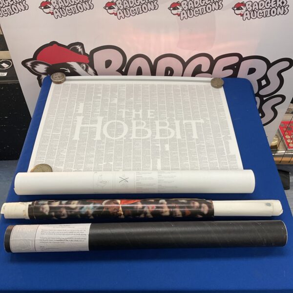 Vintage posters including The Hobbit, The Jam, and Stylo football boots.