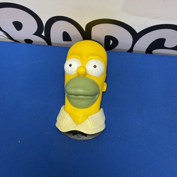 Retro Homer Simpson bottle opener for collectors and fans.