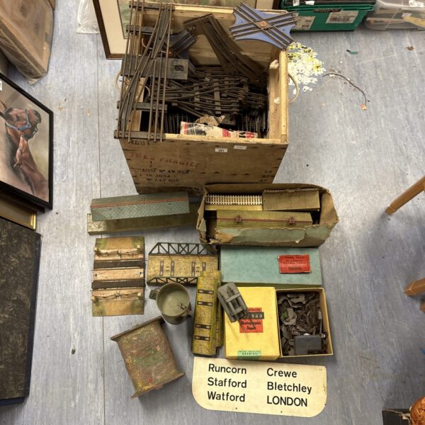Overview of a large Hornby O gauge track collection with accessories.