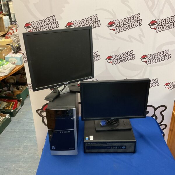 Desktop computer lot with HP Pavilion, ProDesk, and Dell monitors.