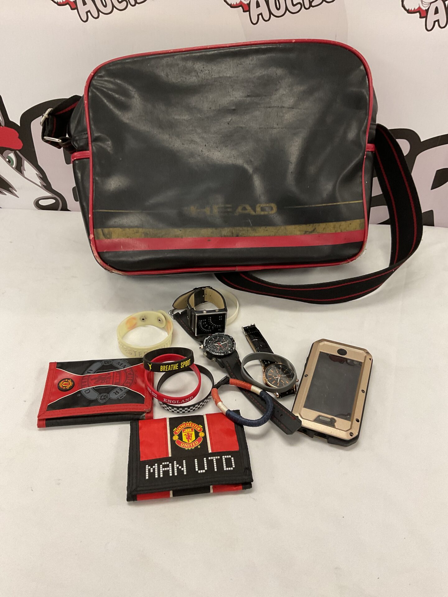 564 Head carry on bag w/ contents inc watches and man utd accessories