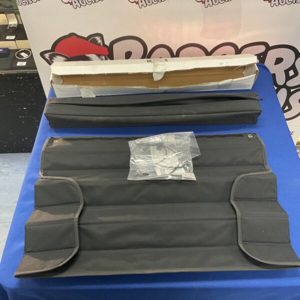Jaguar F Pace boot liner kit displayed on a blue table.