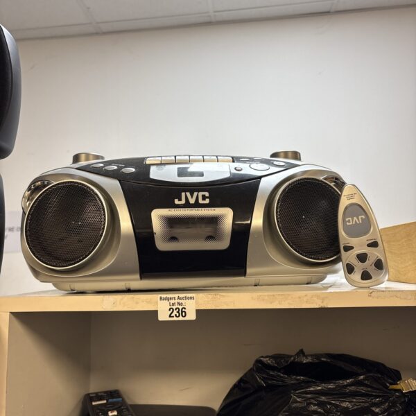Vintage JVC RC-EX10 portable CD system with remote control.