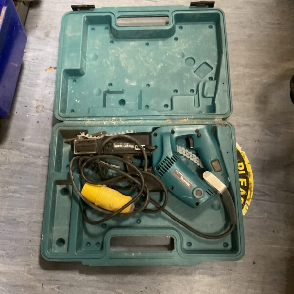 Vintage Makita 110v nail gun in its original carrying case.