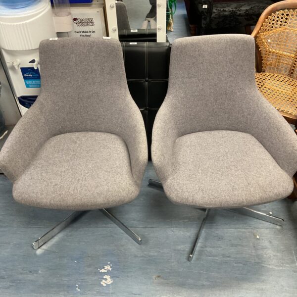 Vintage mid-century modern armchair with a shell design.