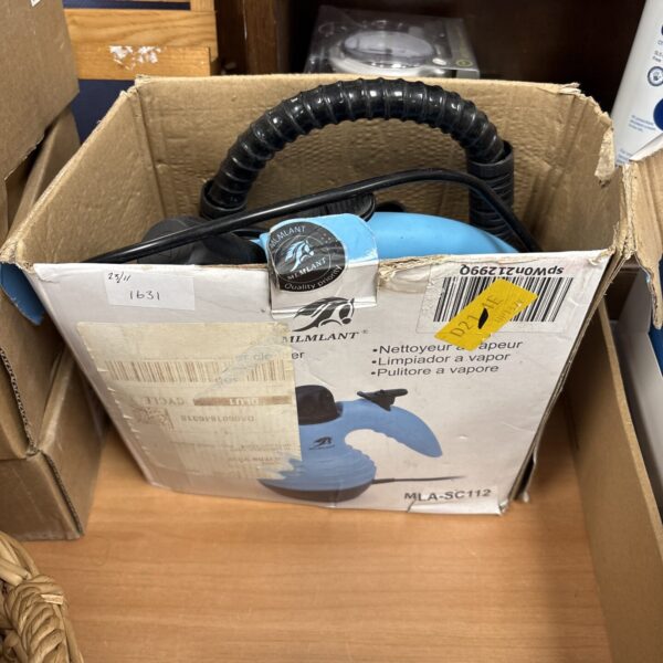 Vintage Milant steam cleaner appliance for home cleaning.