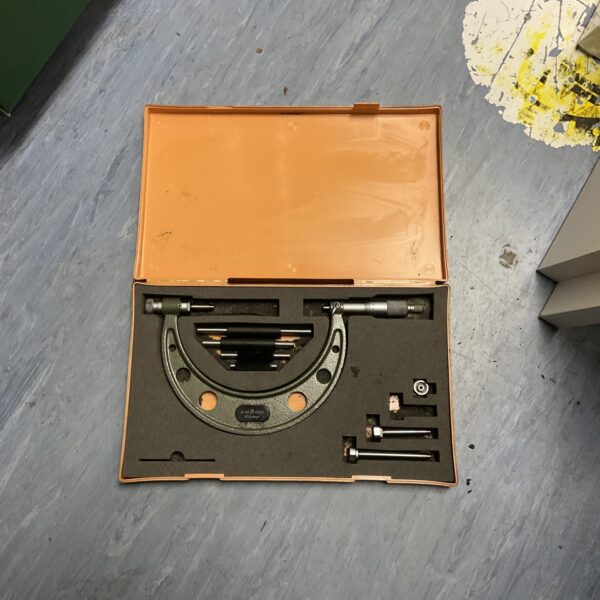 Vintage Mitutoyo 50-150mm micrometer in its case.